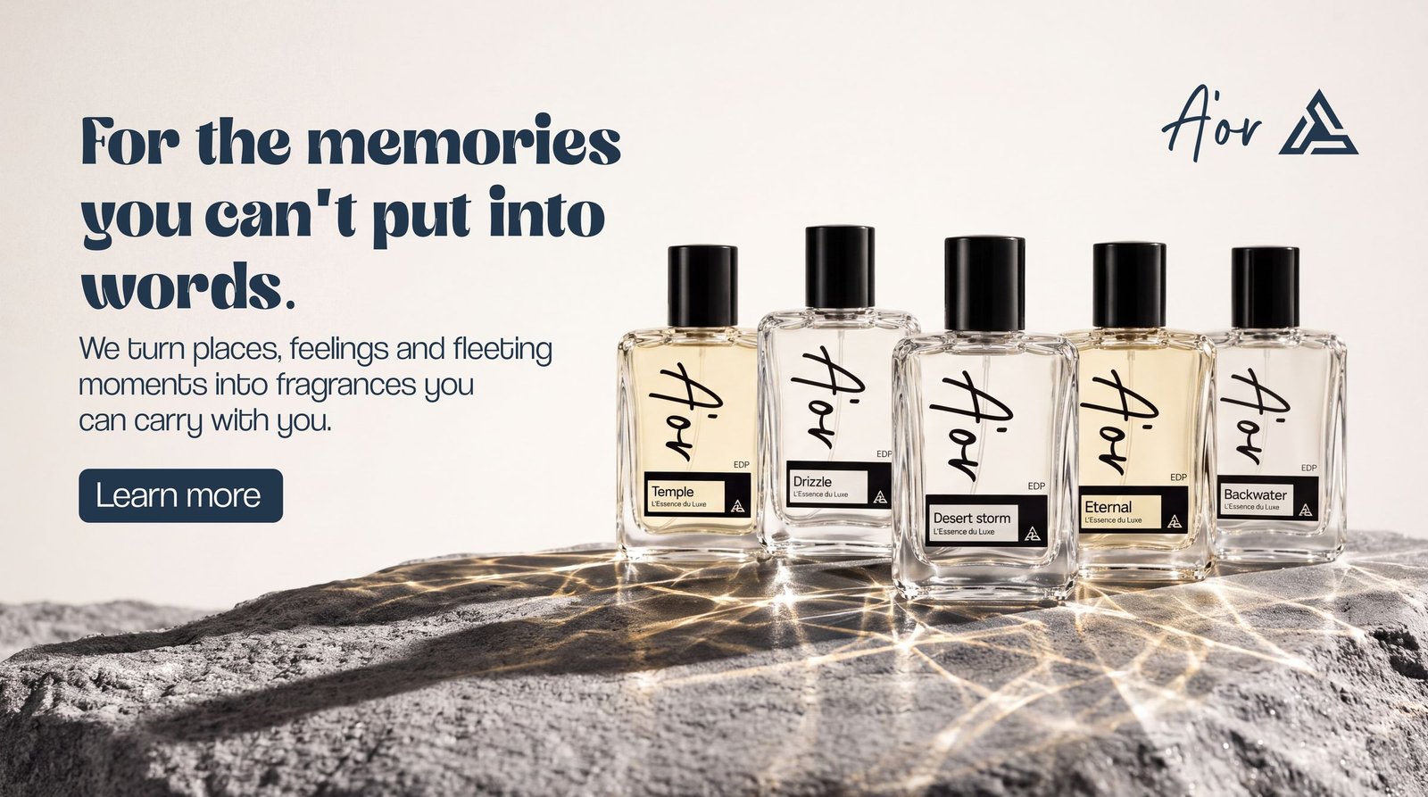 Five A'OR perfume bottles — Temple, Drizzle, Desert storm, Eternal and Backwater — on a stone slab in dappled light